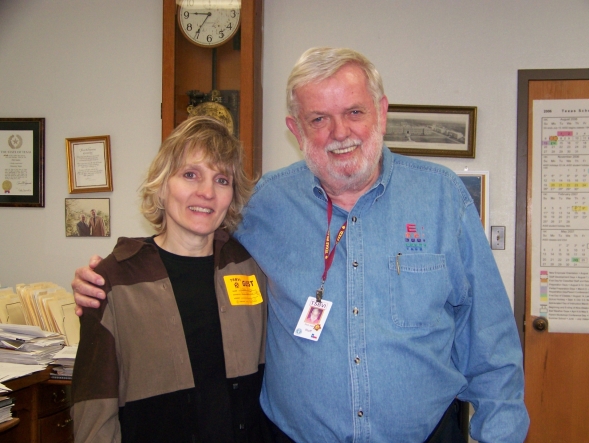 Lanna standing next to Phil at a conference in 2007.