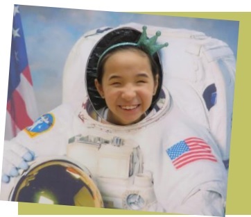 A student wearing a NASA Space Suite