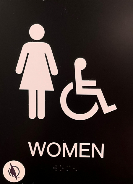 the sign for the women's bathroom at NDVS/SB has a WayAround tag in the bottom left corner