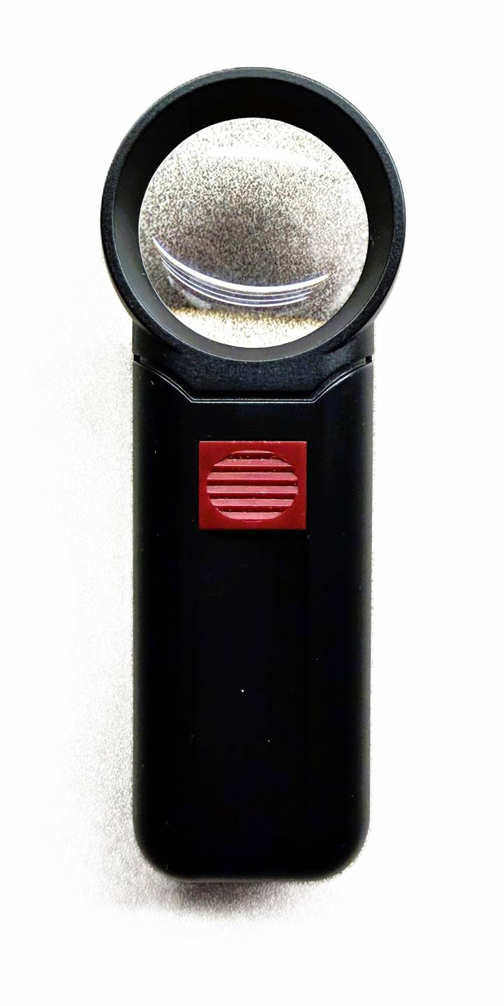 5x illuminated magnifier with a slide button on the handle and a round magnifying lens, 5 inches long