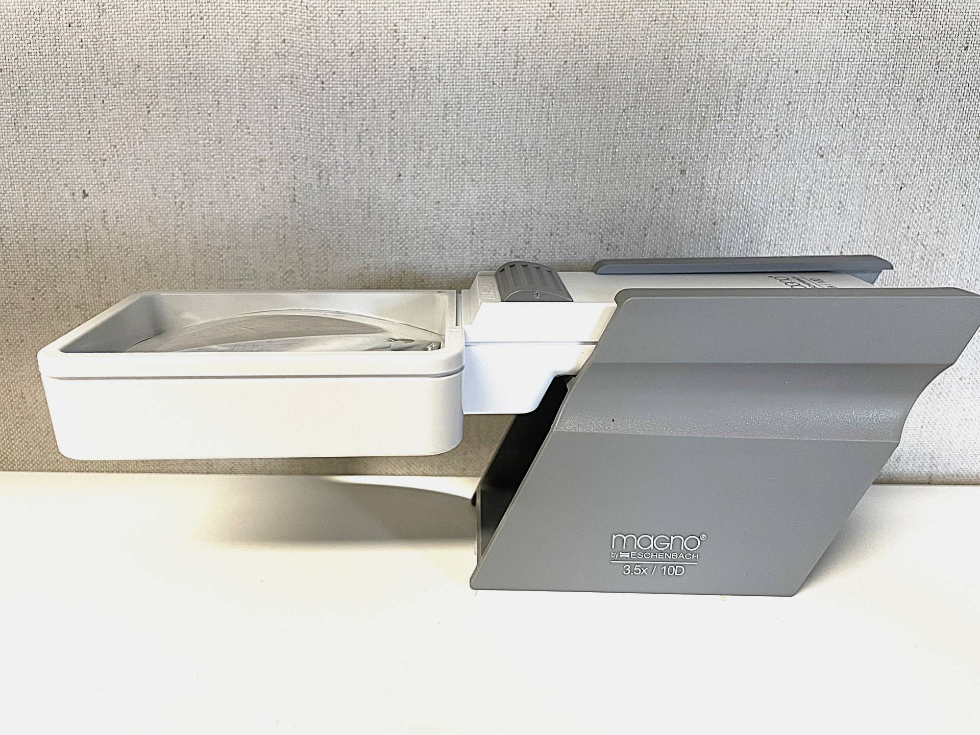 3.5x magnifier in slanted gray holder
