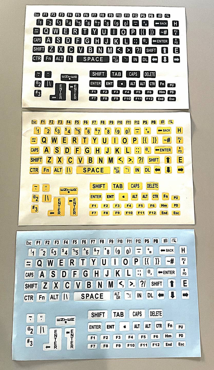 Large print keyboard labels, white on black, black on yellow, black on white