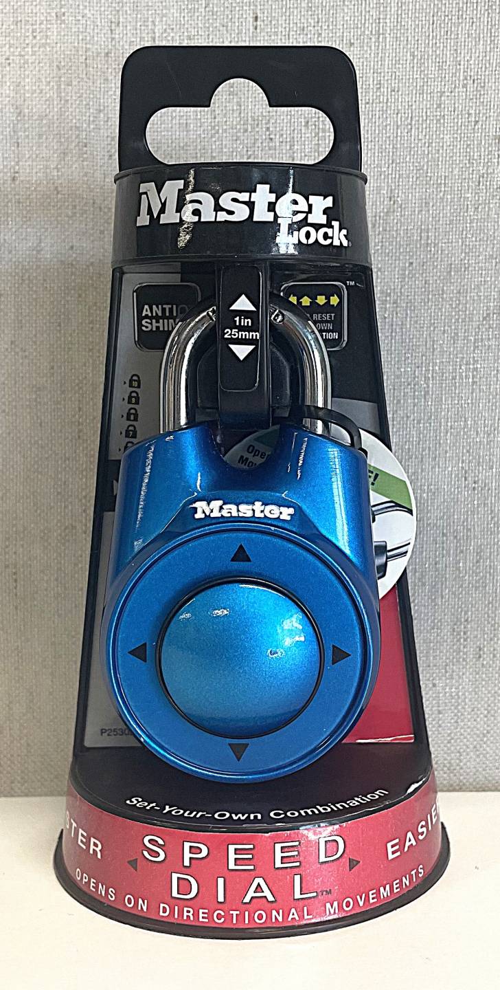 Master Speed Dial Lock, combination lock with smooth center dial and arrows pointing in 4 directions