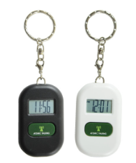 Atomic Talking Keychain, rectangle with digital clock face and one button underneath, has small chain and a keyring attached at the top