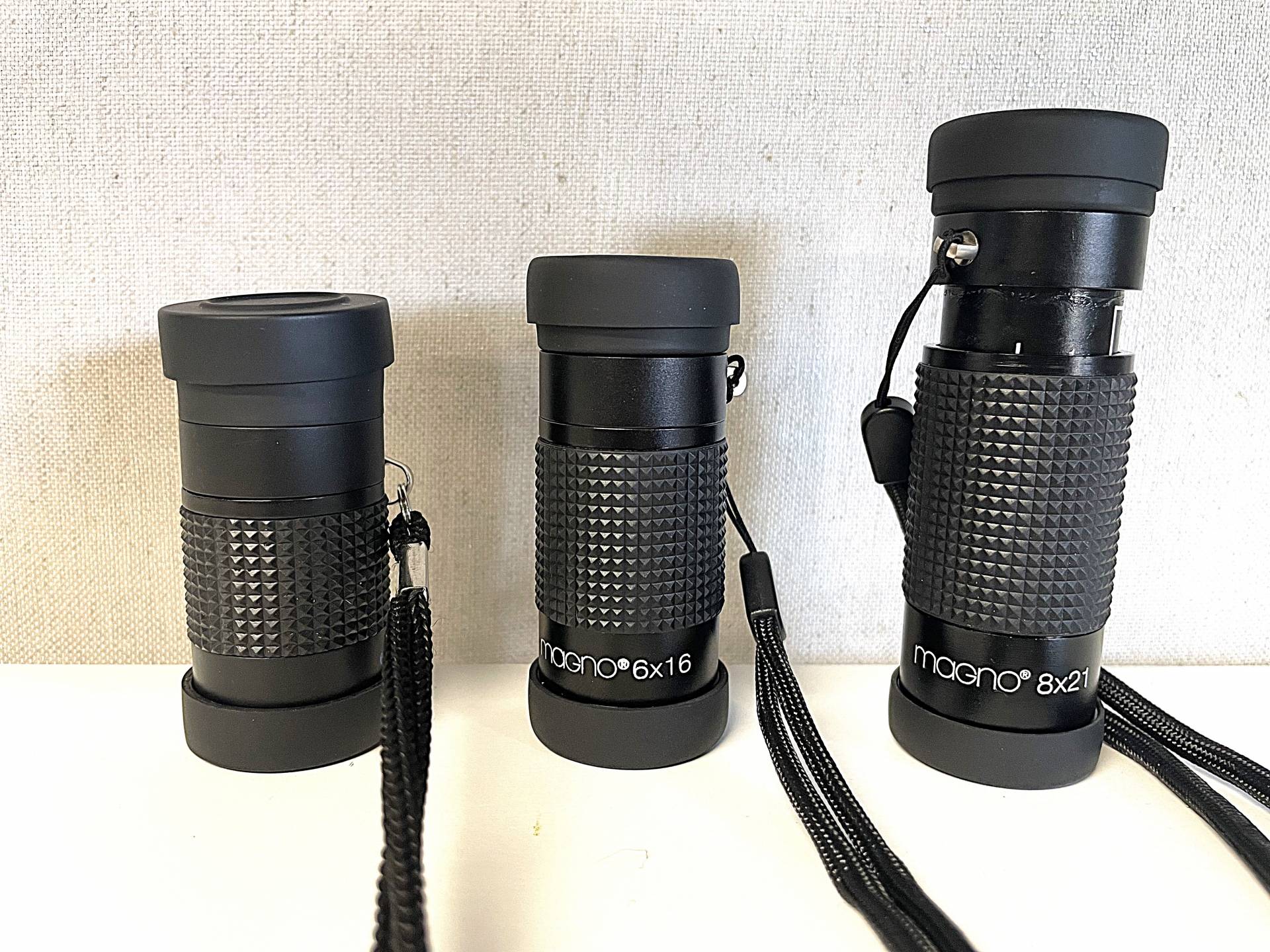 small, medium, and large upright round magnifiers