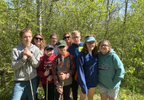Seven Students and two teachers that went on a hike at Camp Metigoshe Area